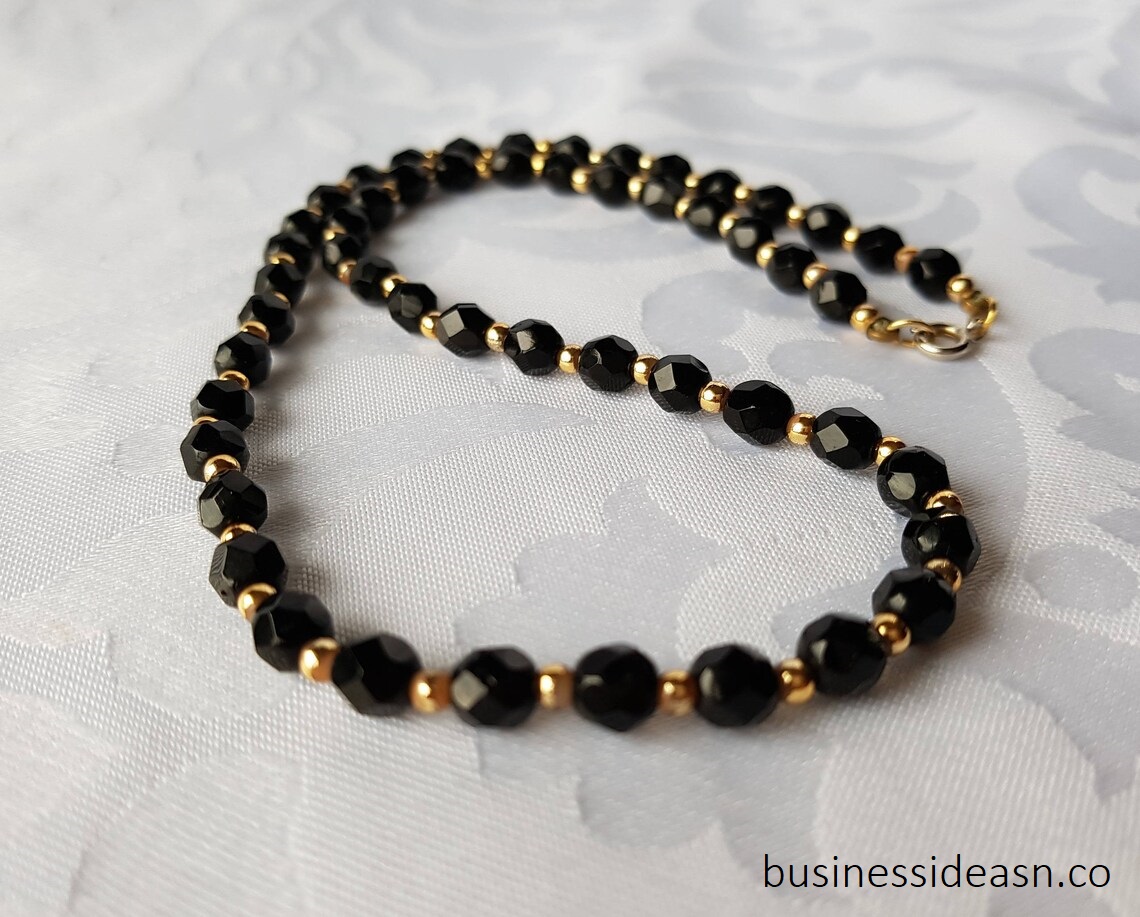 The Kate Spade Black Faceted Bead Station Chain Necklace | businessideasn